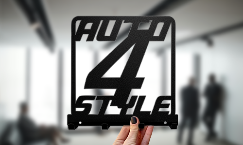 Custom metal key holder with bold numeric lettering and modern cutout style