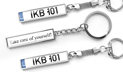 Business style metal keychains with custom license plate text and engraved message design