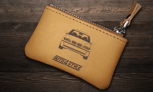 Brown leather key pouch with zipper, printed car and plate 