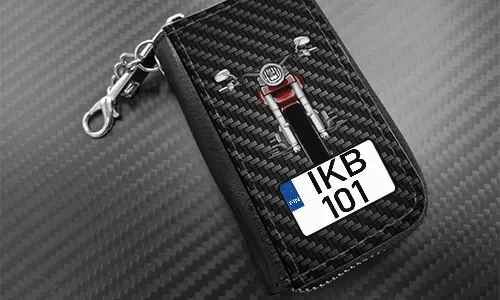 autoschlüssel cover mit Carbon Hintergrund und Motorradsilouette autoschlüssel cover