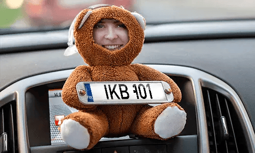Cuddly toy with photo in the car Cuddly toy with photo in the car