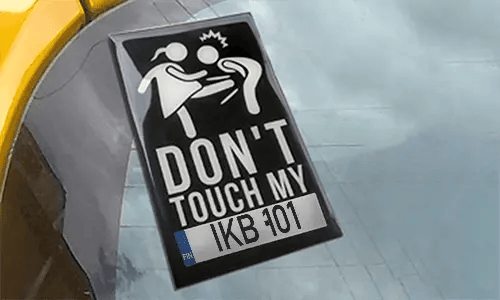 llicense plate sticker restangular on the glass