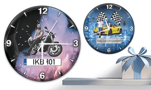 Two wall clocks with male figures and vehicles: left with motorcycle and flame background, right with yellow sports car and racing flags
