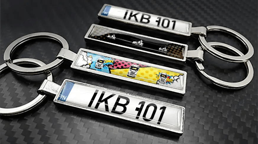 Comic style metal keychains with car illustrations and custom license plate design